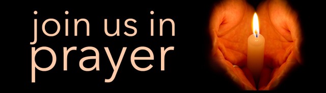 Man hands holding a burning candle